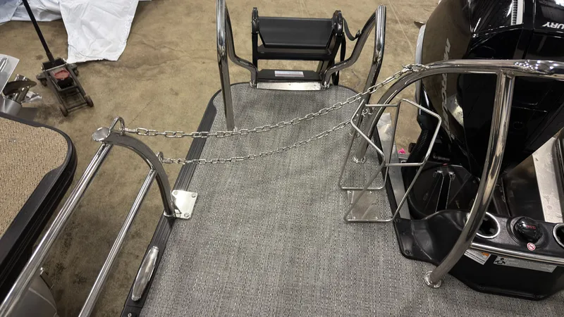 Slide: The Image of 2026 Barletta Lusso 25 U boat with stainless steel railing and motor. - 34