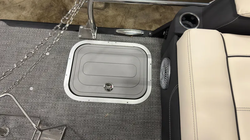 Slide: The Image of Barletta Lusso 25 U 2026 boat deck with storage hatch and seating area. - 36