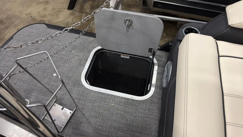 Slide: The Image of Barletta Lusso 25 U 2026 with open storage compartment on deck. - 37