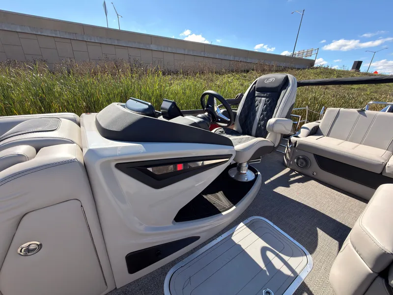 Slide: The Image of The image shows the cockpit of a Barletta Lusso 25 U boat with sleek seating and modern controls. - 45
