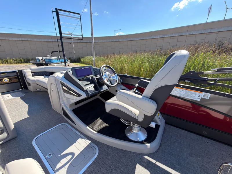Slide: The Image of The image shows the cockpit of a 2026 Barletta Lusso 25 U with a sleek helm station. - 46