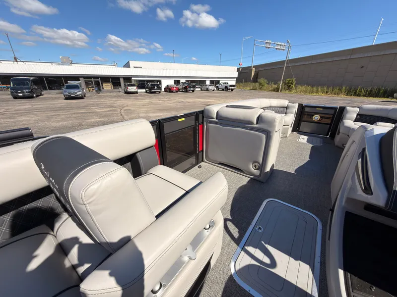 Slide: The Image of The image shows the interior of a 2026 Barletta Lusso 25 U with luxurious seating. - 38