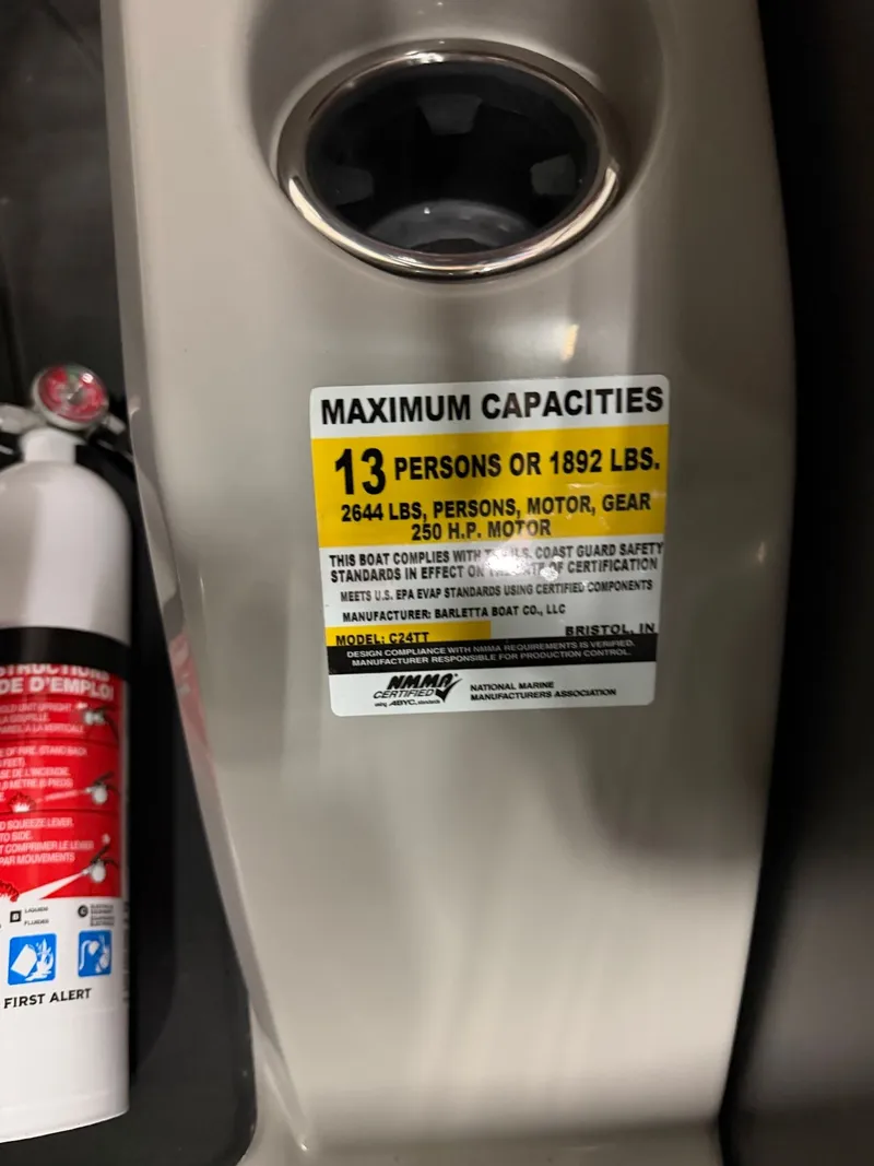 Slide: The Image of Barletta Cabrio 24 M 2026 boat capacity label with fire extinguisher. - 23