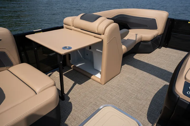 Slide: The Image of Interior of 2026 Barletta Cabrio 24 M with beige seating and table. - 8