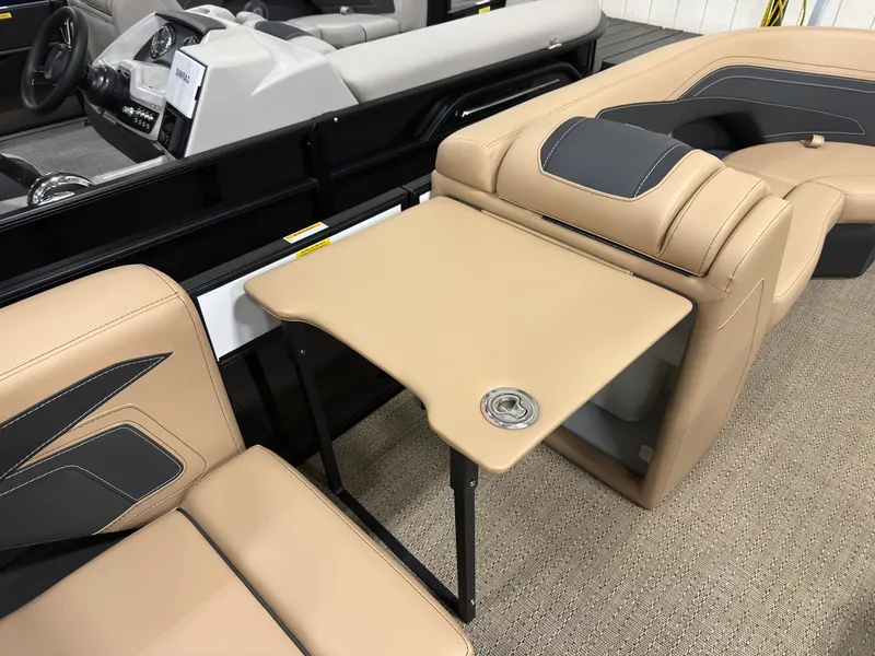 Slide: The Image of Interior of 2026 Barletta Cabrio 22 U with beige seats and table. - 10