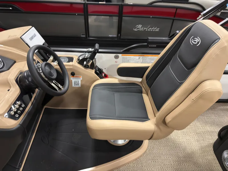 Slide: The Image of Interior of 2026 Barletta Cabrio 22 U with steering wheel and seat. - 11