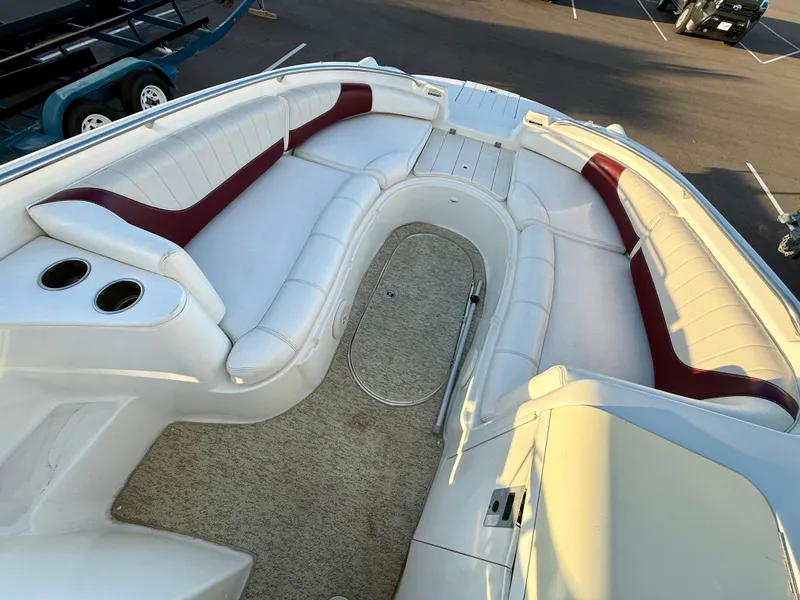 Slide: The Image of 2013 Ebbtide 2500 SS Fun Cruiser DC boat with spacious seating and cup holders. - 10