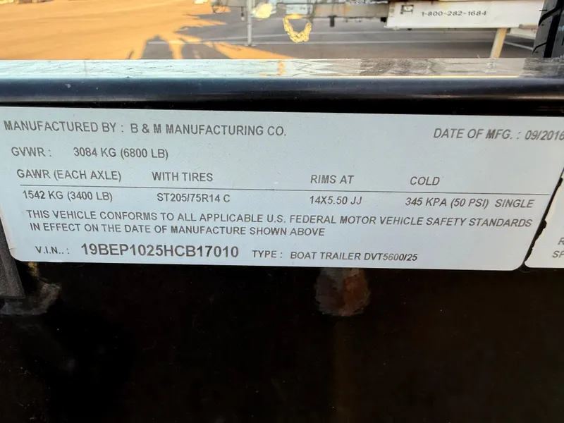 Slide: The Image of Label on a 2013 Ebbtide 2500 SS Fun Cruiser DC, detailing specifications and compliance. - 16