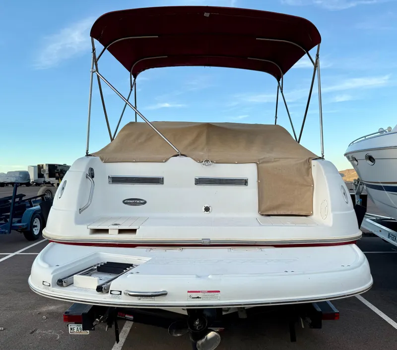 Slide: The Image of 2013 Ebbtide 2500 SS Fun Cruiser DC boat with red canopy and covered deck. - 7