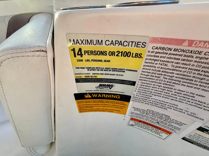 Slide: The Image of Capacity label on 2013 Ebbtide 2500 SS Fun Cruiser DC, seating 14 or 2100 lbs. - 8