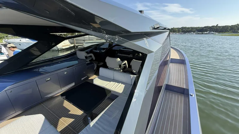 Slide: The Image of Luxurious Santasevera52 yacht interior with sleek design, docked by a scenic waterfront. - 12