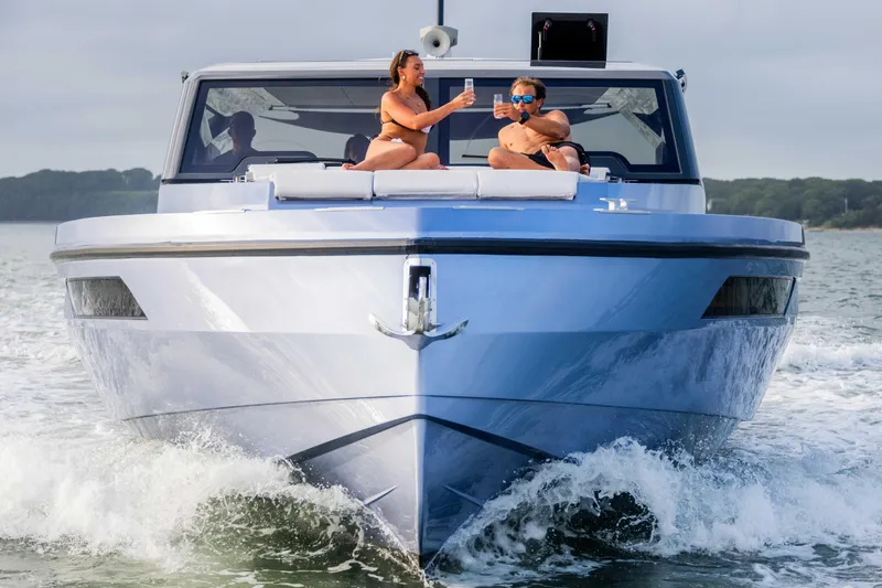 Slide: The Image of Luxury Santasevera52 yacht cruising with two people enjoying drinks on deck. - 7