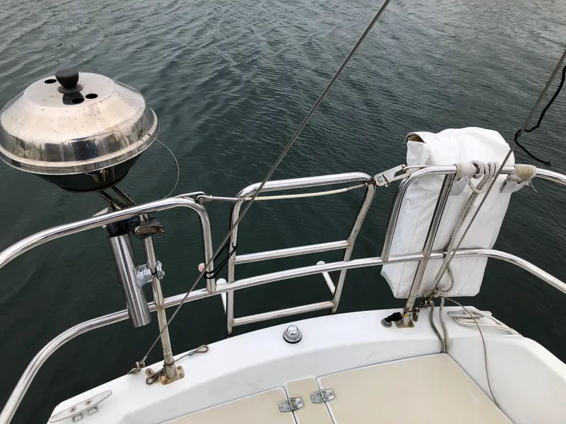 Slide: The Image of Sailboat deck with grill and railing, Ericson 30+, 1988 model. - 4