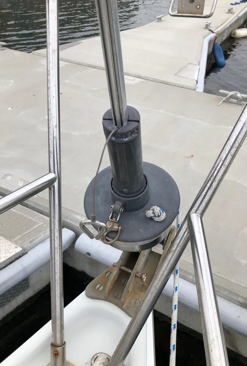 Slide: The Image of Close-up of a 1988 Ericson 30+ sailboat's furling system at the dock. - 6