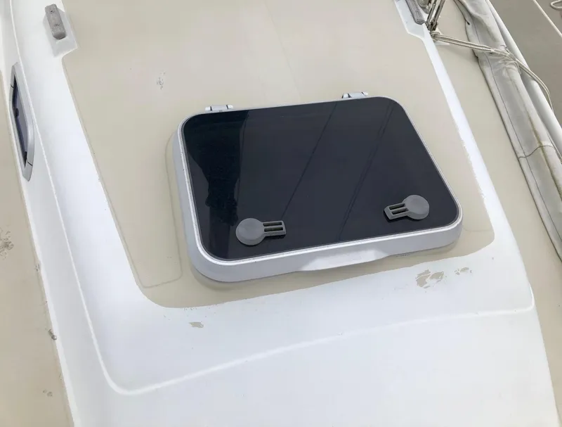 Slide: The Image of 1988 Ericson 30+ yacht deck with a closed hatch. - 7