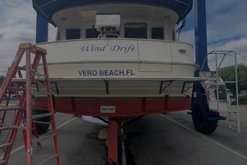 Slide: The Image of Cherubini Independence 1998 boat named "Wind Drift" in Vero Beach, FL, on dry dock. - 106