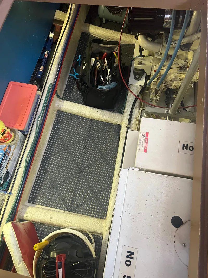 Slide: The Image of Engine room of a 1998 Cherubini Independence with tools and equipment. - 49