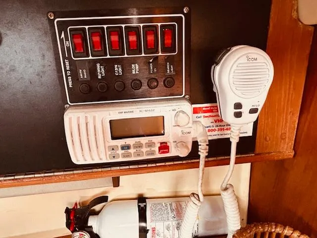 Slide: The Image of Control panel and radio equipment on a 1986 Pearson 28 sailboat. - 21