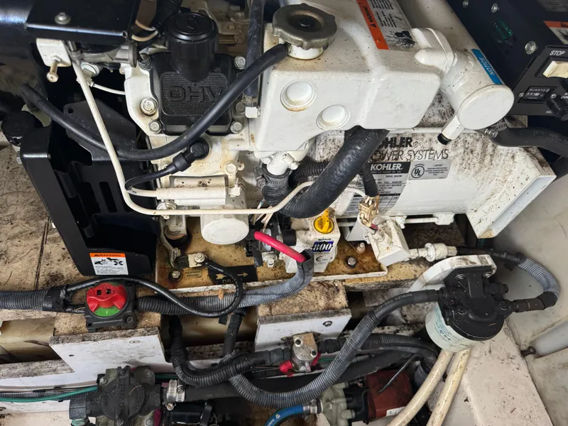 Slide: The Image of Engine compartment of a 2005 Sea Ray 260 Sundancer with Kohler power systems. - 14