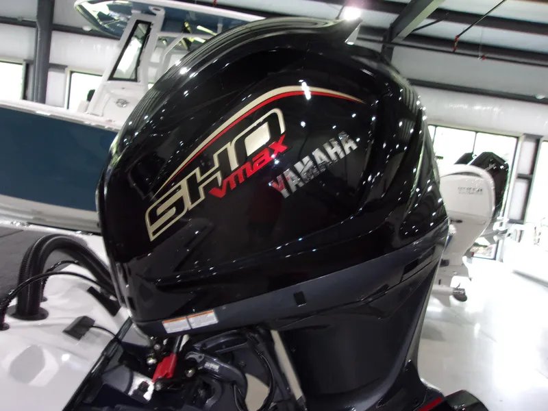Slide: The Image of Yamaha SHO VMAX engine on 2026 Skeeter ZXR-20 SE boat in showroom. - 10