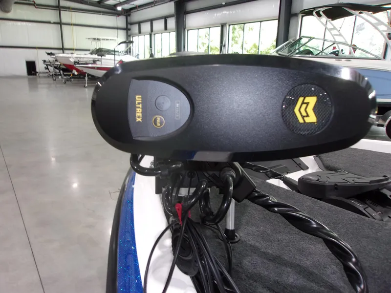 Slide: The Image of 2026 Skeeter ZXR-20 SE boat with Ultrex trolling motor in showroom. - 14
