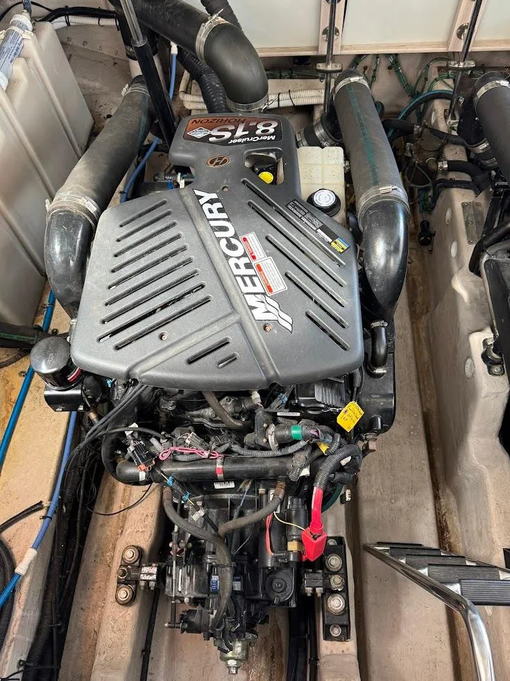 Slide: The Image of Engine compartment of a 2003 Sea Ray 420 Sundancer with Mercury 8.1L engine. - 26