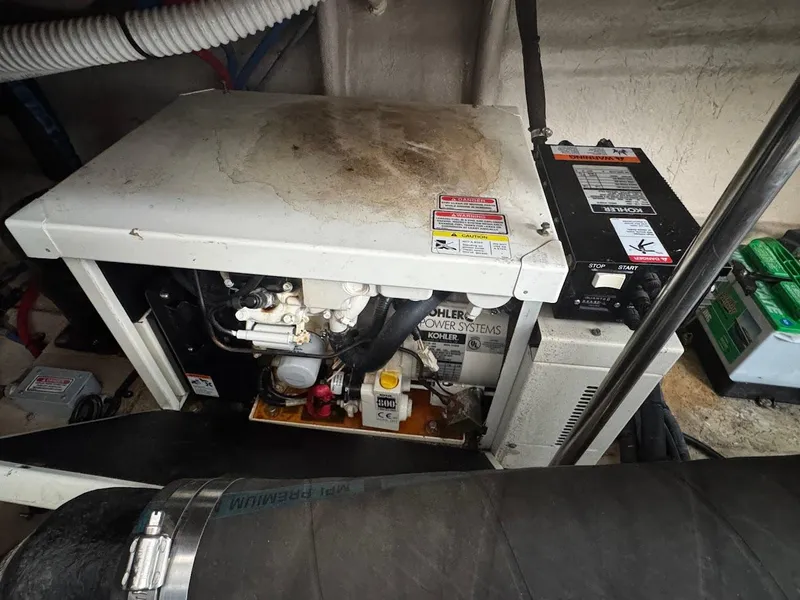 Slide: The Image of Engine room of 2003 Sea Ray 420 Sundancer with Kohler power system. - 30