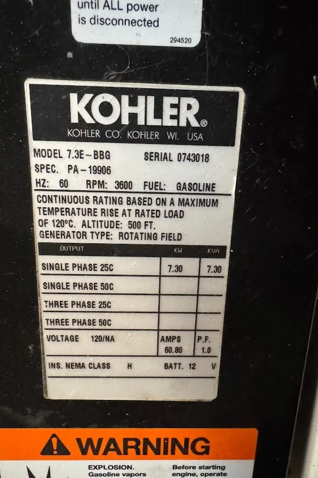 Slide: The Image of Kohler generator label with specifications and warning, Sea Ray 420 Sundancer 2003 model. - 31