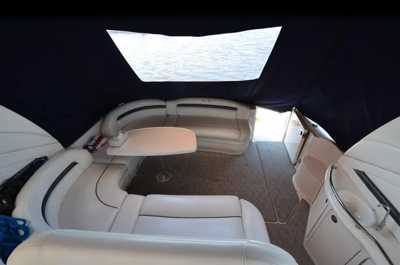 Slide: The Image of Interior of 2003 Sea Ray 420 Sundancer yacht with seating and table. - 5