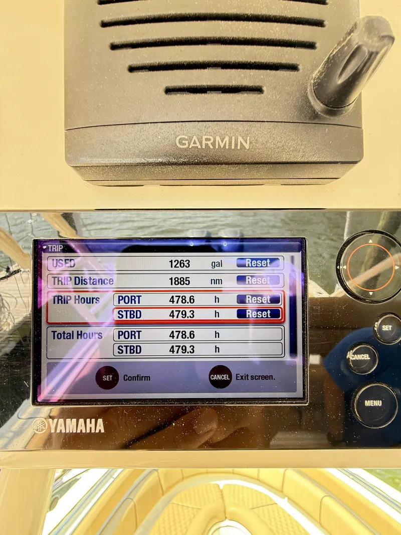 Slide: The Image of Yamaha display showing trip data on a 2014 Pursuit ST 310 Sport boat. - 36