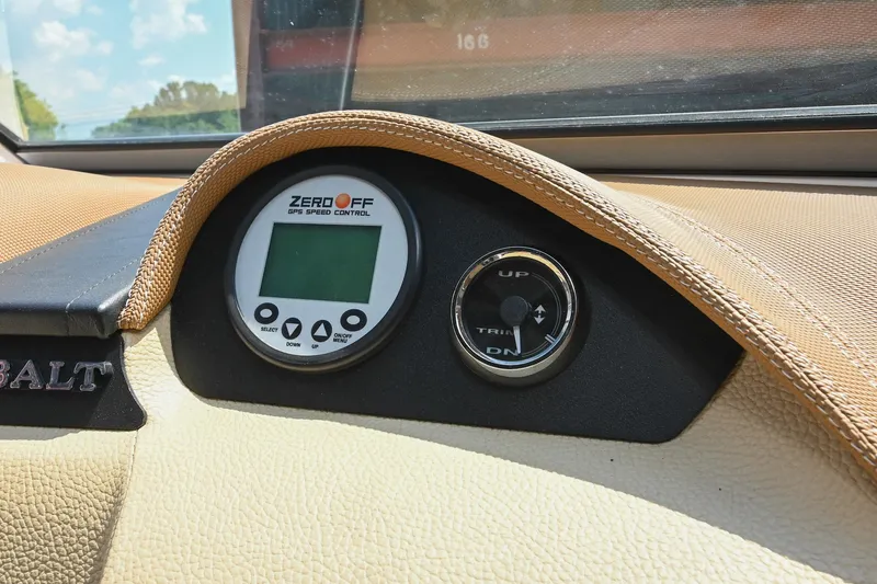 Slide: The Image of Dashboard of a 2015 Cobalt 220 boat with GPS speed control display. - 29