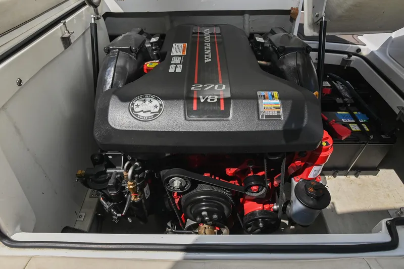 Slide: The Image of 2015 Cobalt 220 boat engine compartment with Volvo Penta 270 V8 engine. - 39