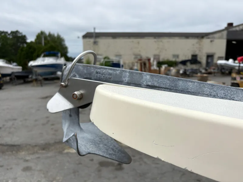 Slide: The Image of Close-up of a Parker 2120 Sport Cabin boat anchor, 2012 model, in a marina setting. - 19