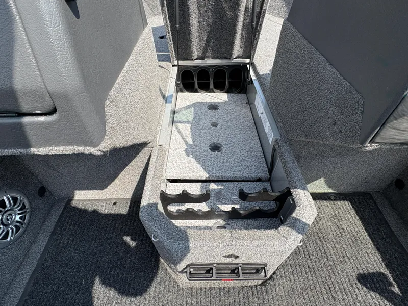 Slide: The Image of 2018 Alumacraft Voyageur 175 Sport boat interior storage compartment. - 17