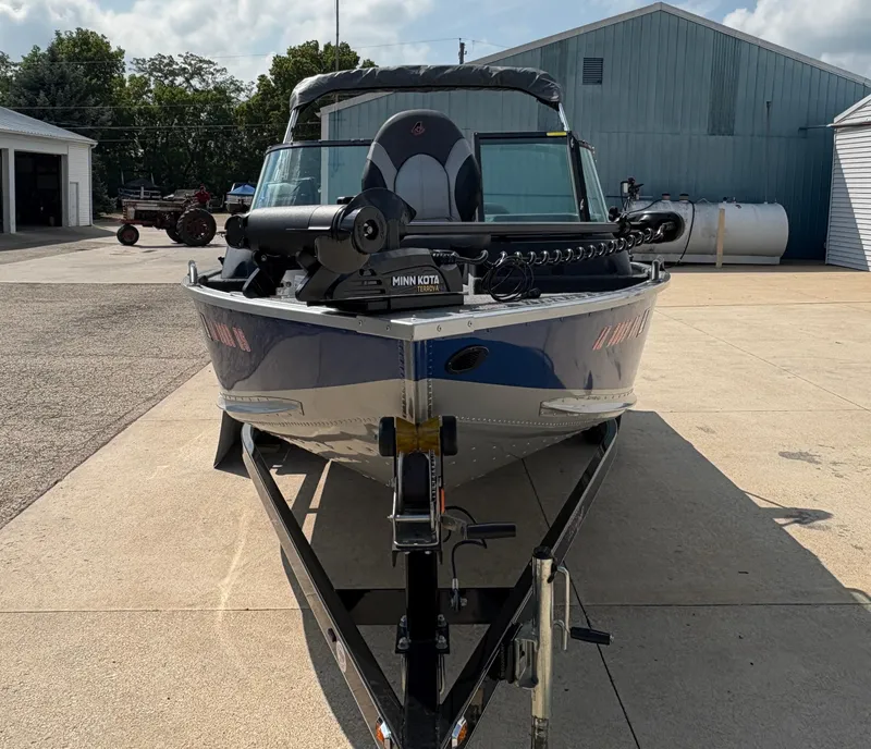 Slide: The Image of 2018 Alumacraft Voyageur 175 Sport boat on trailer, equipped with Minn Kota trolling motor. - 8