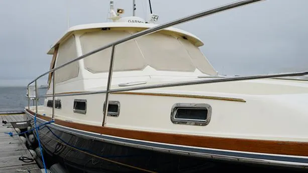 Slide: The Image of 2006 Sabre 38 Hardtop Express yacht docked, showcasing sleek design and elegant craftsmanship. - 5