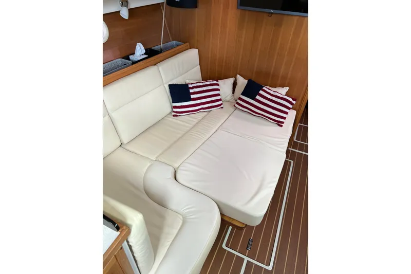Slide: The Image of Luxurious interior of 2007 Catalina 309 yacht with American flag pillows. - 20