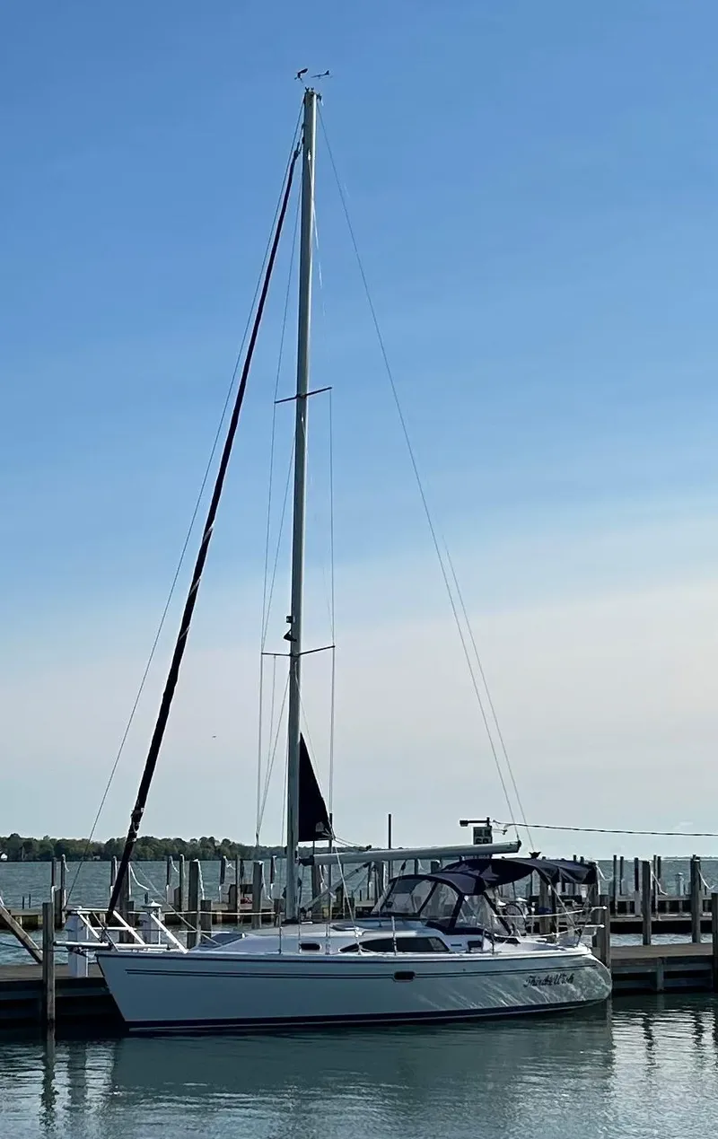 Slide: The Image of Catalina 309 sailboat docked at marina, clear sky, 2007 model. - 8
