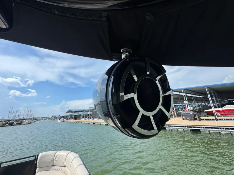 Slide: The Image of Boat speaker on a 2016 Harris Solstice DC 250, dockside view. - 23