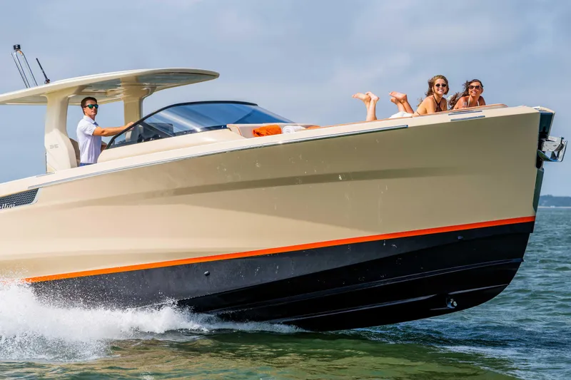 Slide: The Image of 2026 Bellini Astor 36 boat cruising with passengers enjoying the ride. - 10