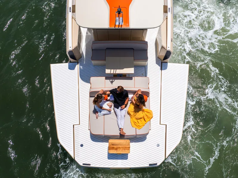 Slide: The Image of Aerial view of people relaxing on a 2026 Bellini Astor 36 yacht deck. - 14