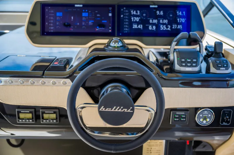 Slide: The Image of Steering wheel and dashboard of 2026 Bellini Astor 36 yacht, featuring advanced navigation controls. - 4