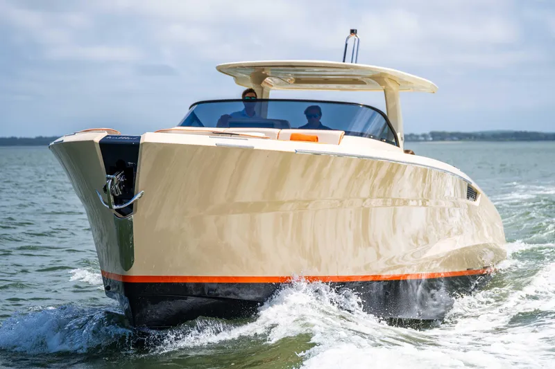 Slide: The Image of 2026 Bellini Astor 36 yacht cruising on open water, showcasing sleek design and luxury. - 7