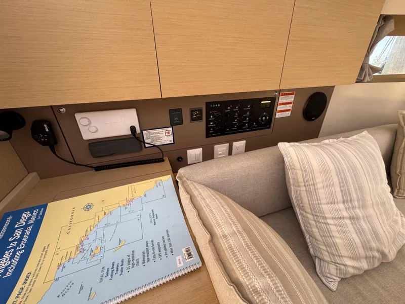 Slide: The Image of Interior of 2021 Beneteau Oceanis 35.1 yacht with navigation chart and control panel. - 11