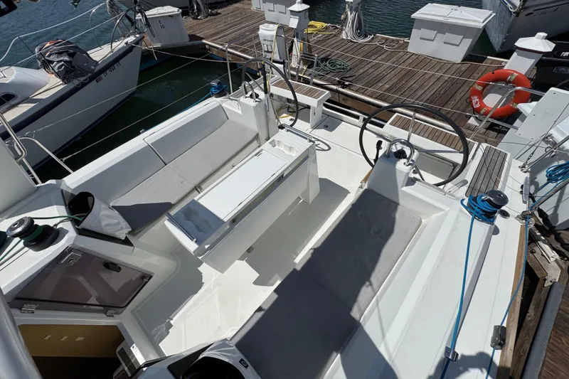 Slide: The Image of Beneteau Oceanis 35.1 sailboat cockpit, 2021 model, docked at marina. - 24