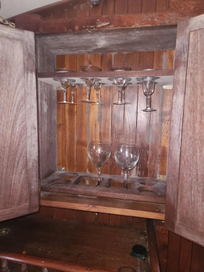 Slide: The Image of Wooden cabinet with wine glasses, Tayana 37, 1976 model. - 24