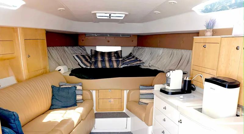 Slide: The Image of Luxurious interior of a 2008 Intrepid 430 Sport Yacht with cozy seating and modern amenities. - 27