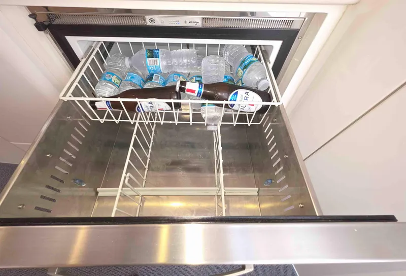 Slide: The Image of Open fridge drawer with water bottles and beer on Intrepid 430 Sport Yacht, 2008. - 34