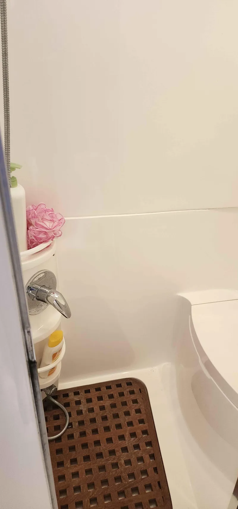 Slide: The Image of Bathroom interior of 2008 Intrepid 430 Sport Yacht with shower and wooden mat. - 43