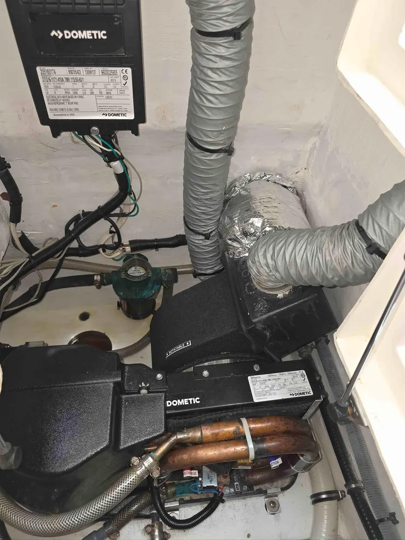 Slide: The Image of Engine room of a 2008 Intrepid 430 Sport Yacht with Dometic equipment. - 48